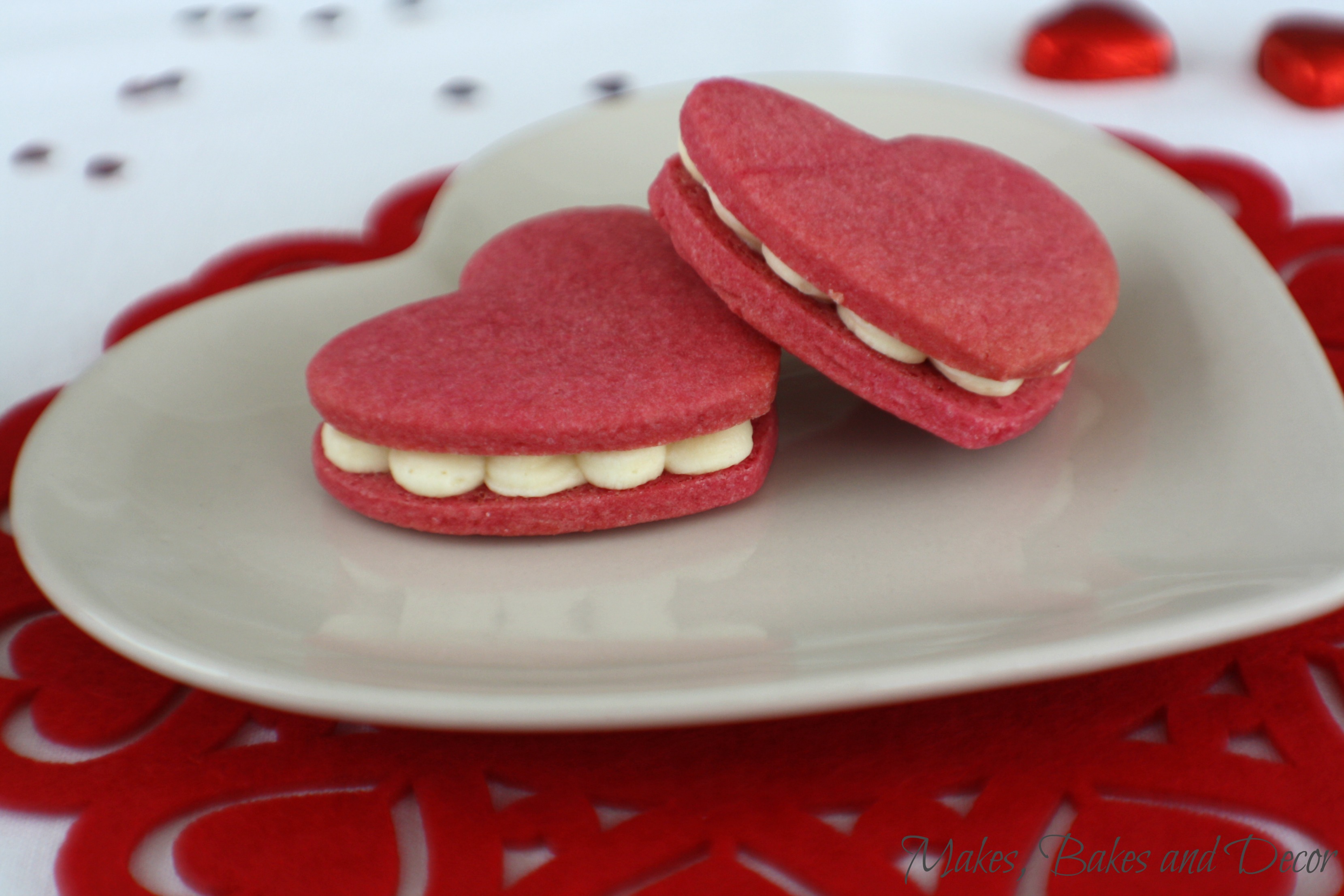 heart sandwich cookies with prosecco buttercream