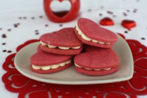 heart sandwich cookies with prosecco buttercream