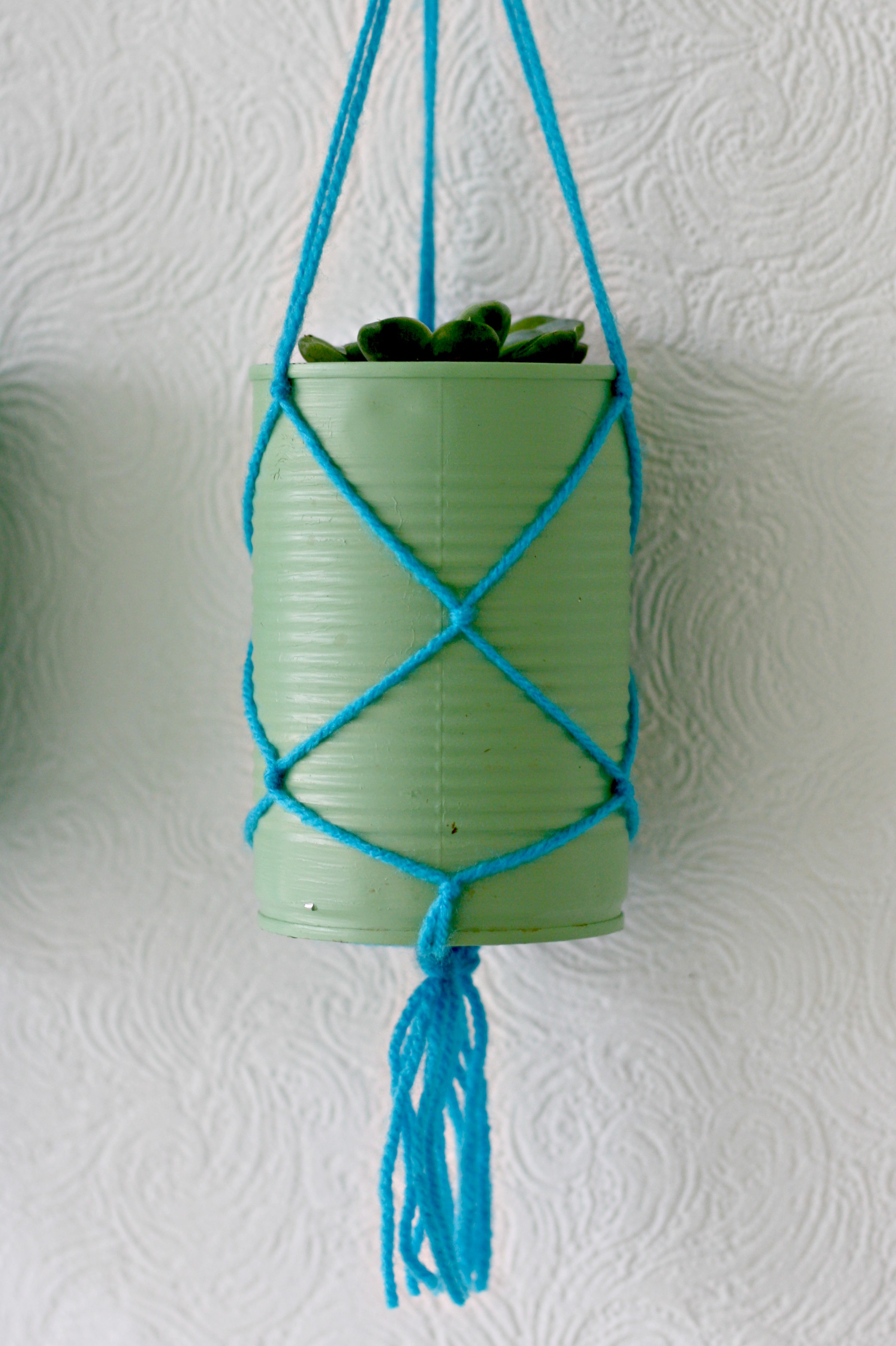 tin can hanging planters