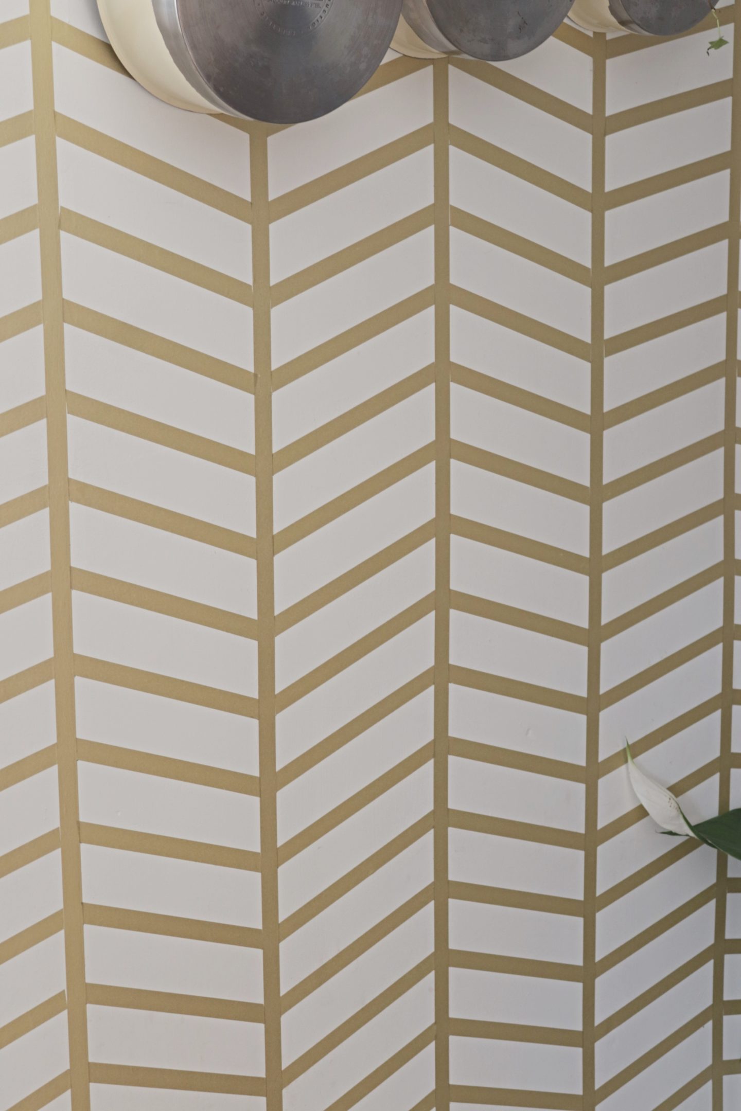 close up of herringbone pattern pf washi tape feature wall