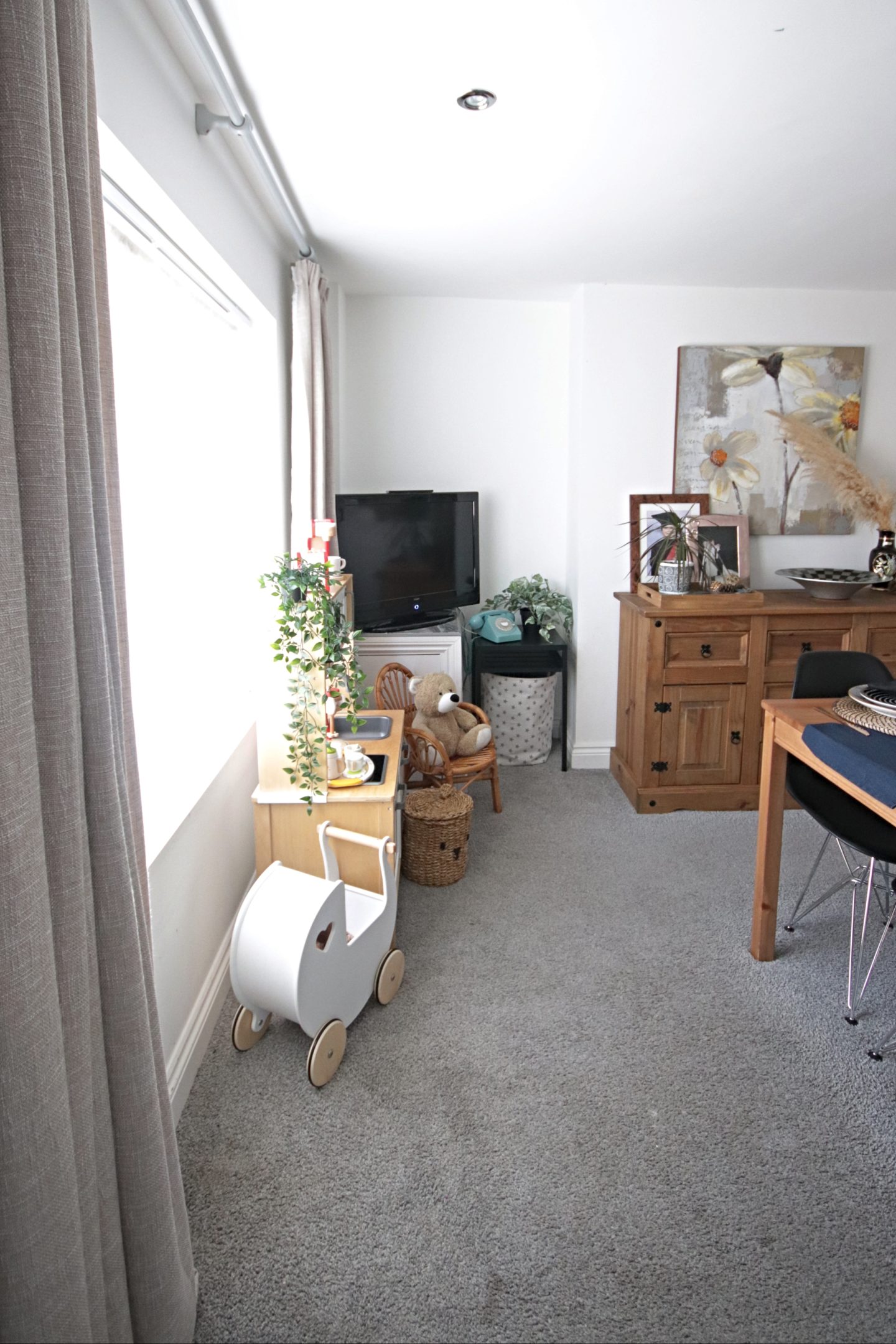 Dining room update including new Eames replica chairs and an ikea billy bookcase hack