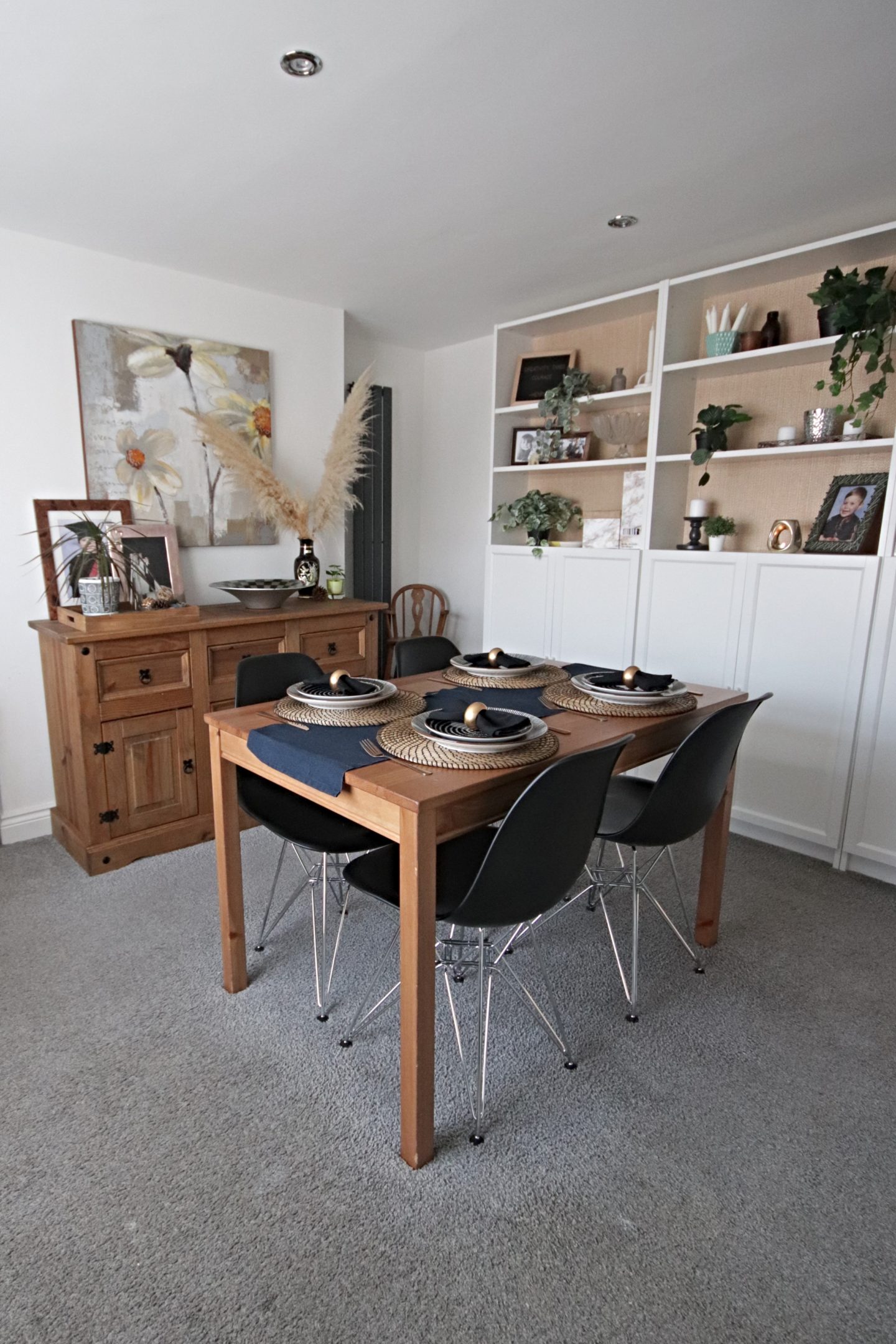 Dining room update including new Eames replica chairs and an ikea billy bookcase hack