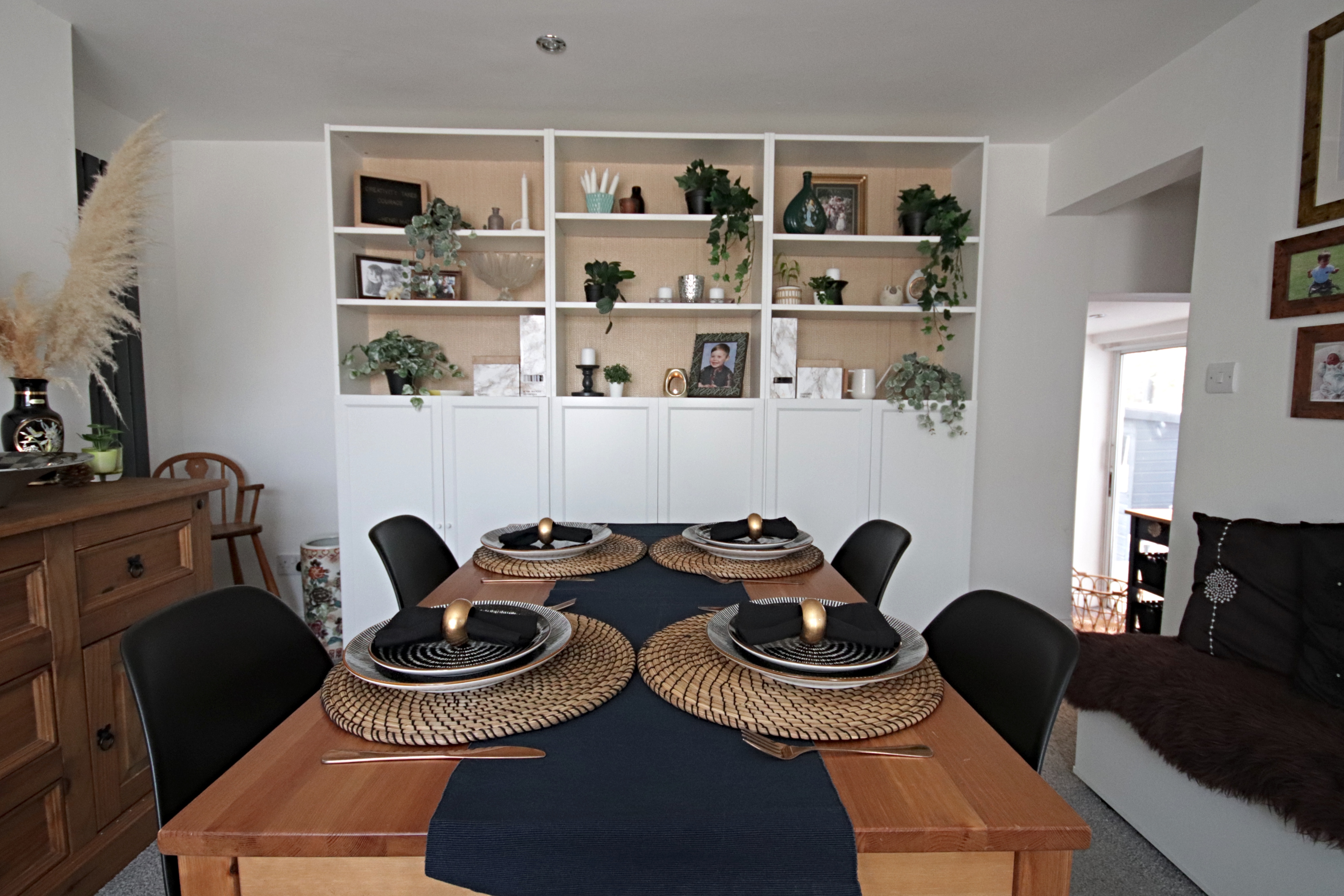 Dining room update including new Eames replica chairs and an ikea billy bookcase hack