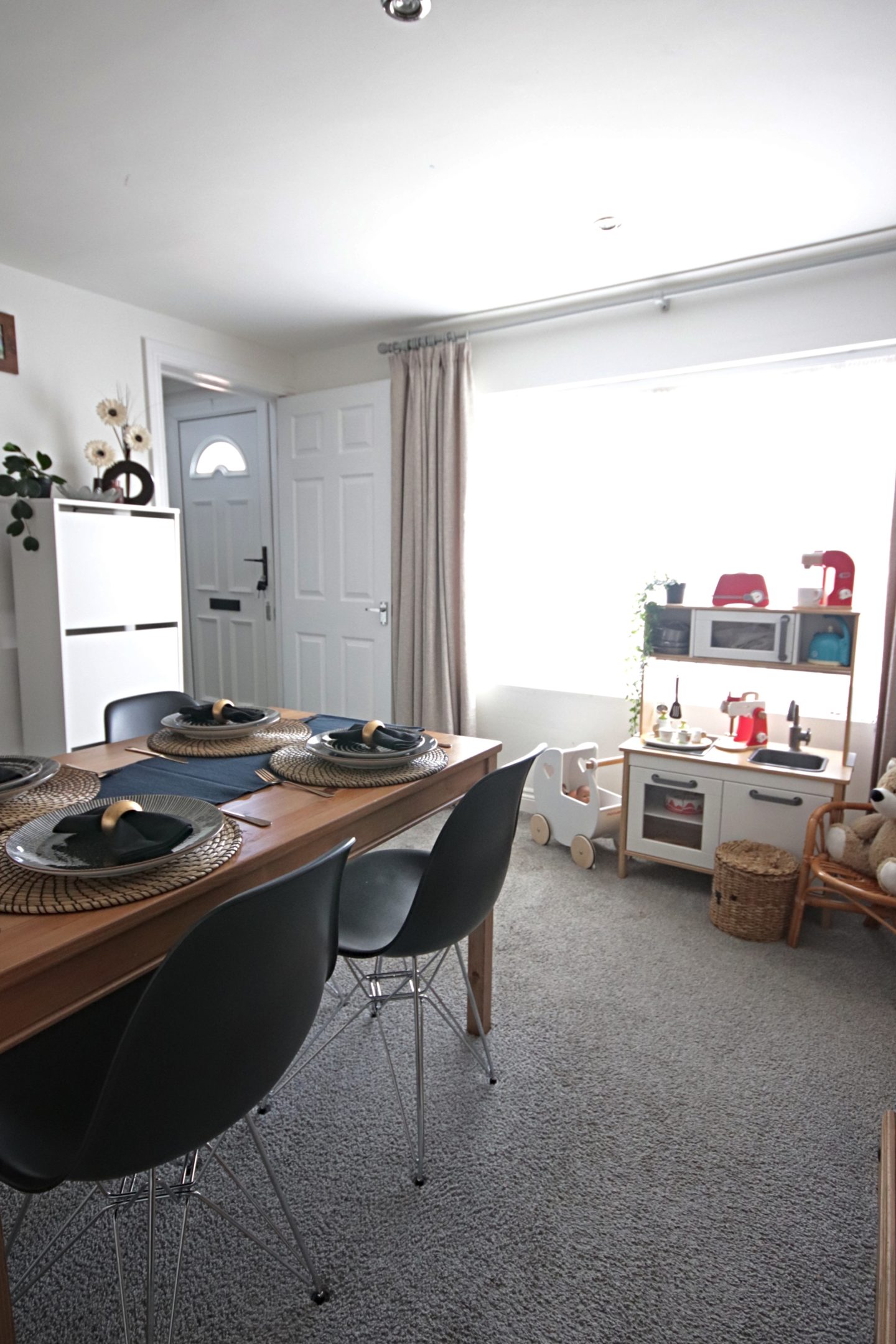 Dining room update including new Eames replica chairs and an ikea billy bookcase hack