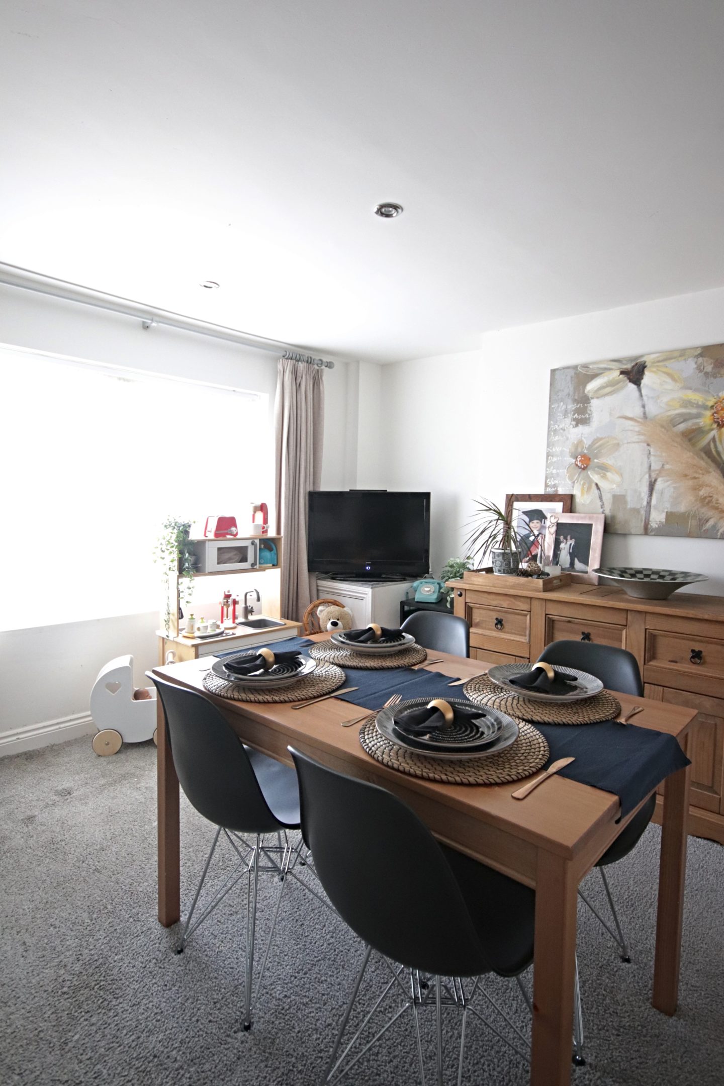 Dining room update including new Eames replica chairs and an ikea billy bookcase hack