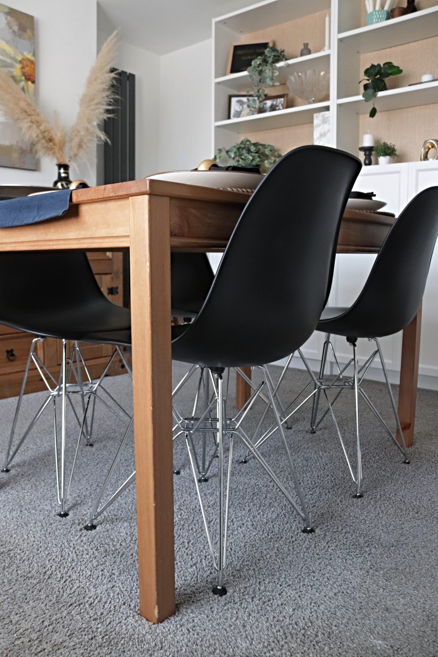 Dining room update including new Eames replica chairs and an ikea billy bookcase hack